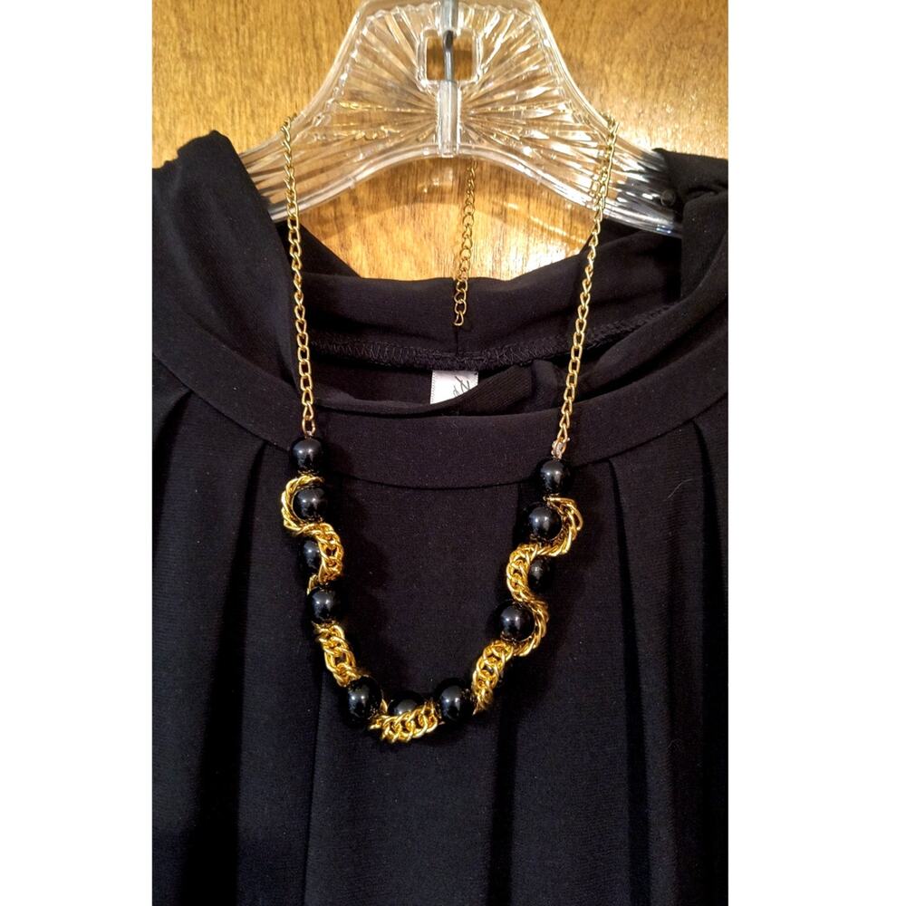 1184. Black and Gold Tone Serpentine Vintage Necklace
